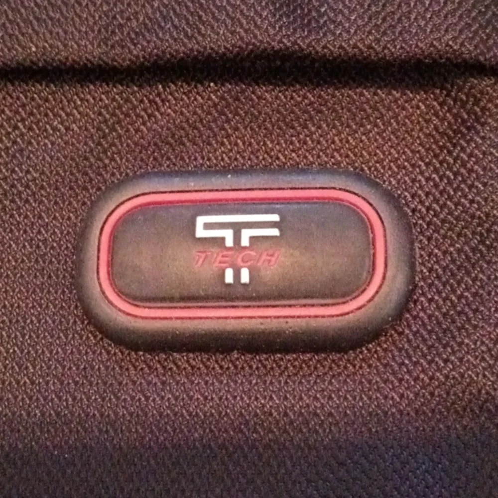 Tumi Black Laptop Messenger Bag.